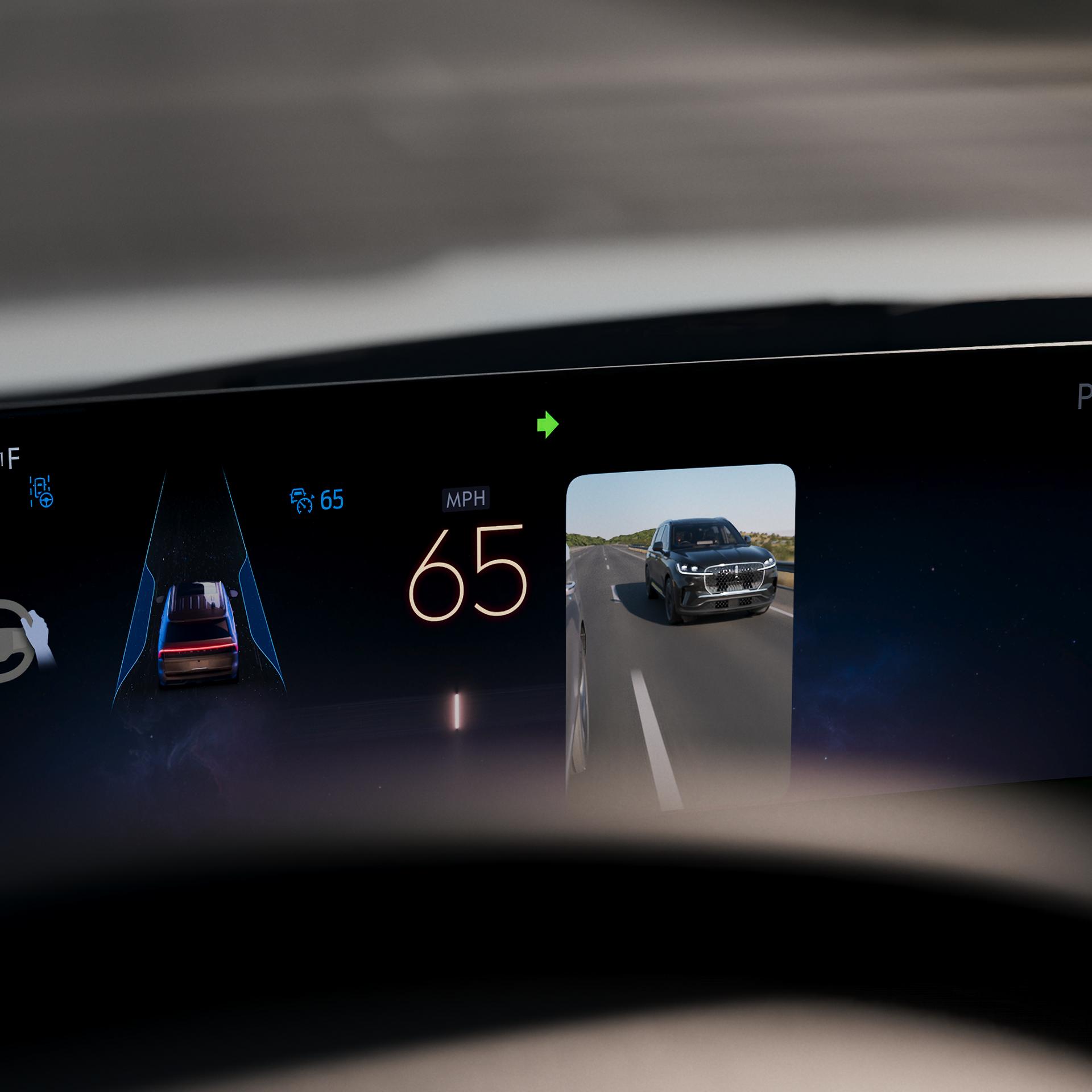 L’affichage panoramique du VUS Lincoln Navigator® 2027 montre la caméra latérale qui active Turn Signal View