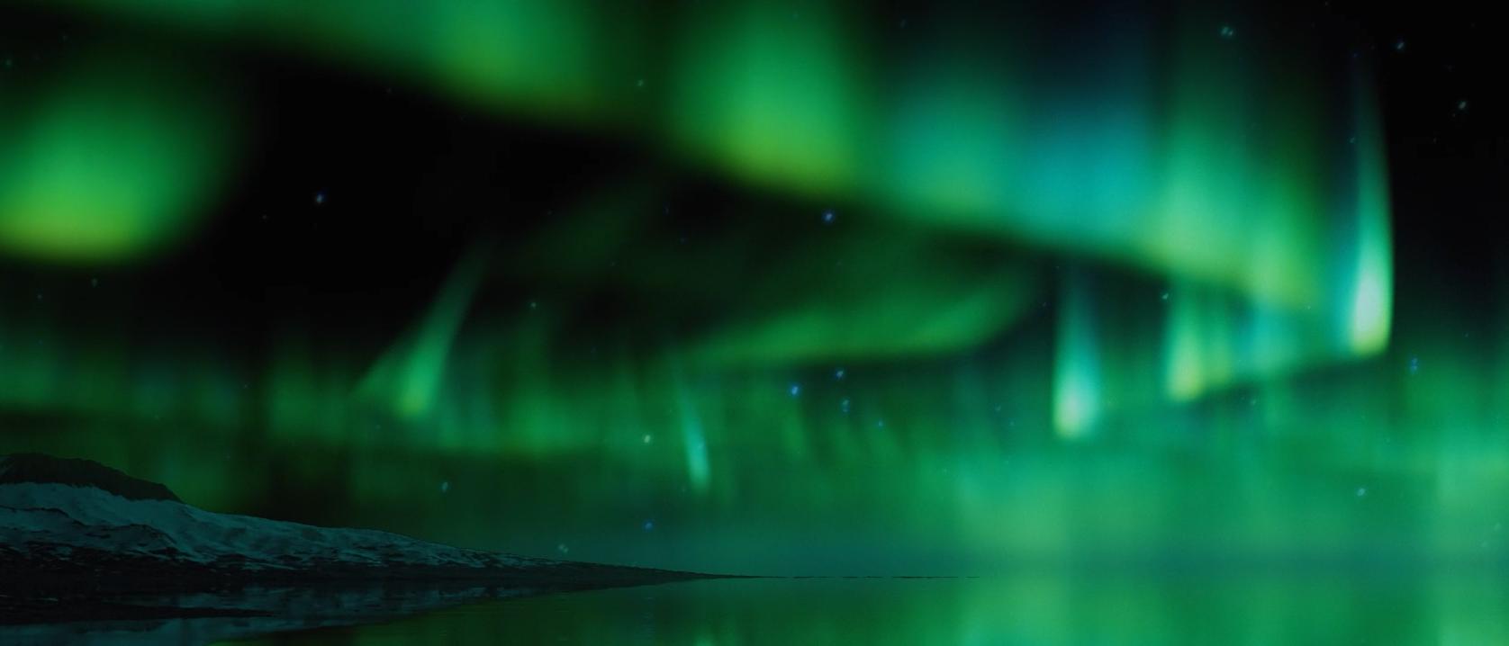 Vignette vidéo de la thématique élargie Aurora Borealis montrant des rubans d’aurores boréales vertes tourbillonnant dans un ciel nocturne étoilé.