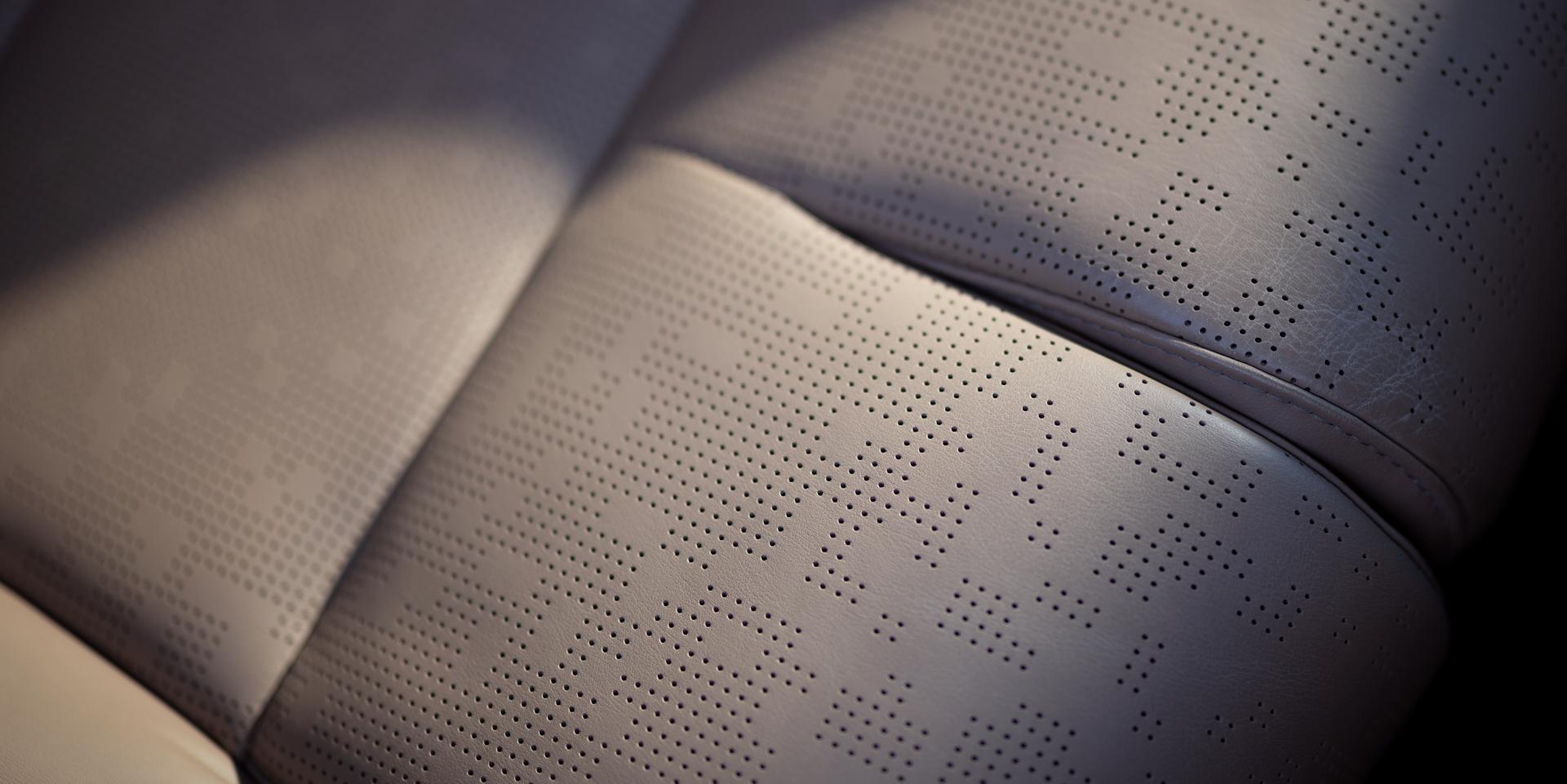 Le motif de perforation sur le siège avant d’un modèle Lincoln Navigator® Black Label™ 2027
